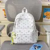 Nueva Mochila Escolar para Niñas Ins Nicho Alta Apariencia Mochila de Estrellas Pequeñas para Estudiantes de Primaria Estilo Coreano Gran Capacidad Mochila para Estudiantes de Secundaria