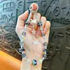 Estilo luxo leve borla borboleta com contas corrente para celular chaveiro moda pingente de bolsa requintado acessórios para capa de celular atacado