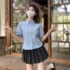 Traje Estilo Universitario Camisa con Mangas Abullonadas Top para Mujer Verano 2024 Nuevo Conjunto de Dos Piezas Falda Plisada de Cintura Alta