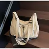 Bolsa de Ombro Casual Popular Estilo Fresco Cor Sólida 2025 Nova Moda Coreana Simples com Cordão e Pregas na Axila