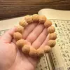 Cuerda de mano de nogal seleccionada, grano de cerebro salvaje, nogal pequeño, juego Wen antiguo de Pekín, cuentas Bodhi de melocotón plano, venta al por mayor de fábrica
