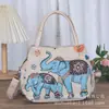 Bolso tote de estilo étnico nuevo, bolso casual de tela versátil, para hombro, mano y cruzado, bolso de dama multiusos