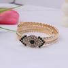 Pulsera retráctil personalizada retro con diamantes de ojo de diablo de color europeo y americano de alta gama, joyería para mujer