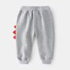 Pantalones Deportivos para Niños 2026 Primavera y Otoño Pantalones de Chándal con Dientes de Dinosaurio para Niños Pantalones Casuales para Bebé Pantalones Largos Venta al por Mayor