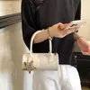 Elegante y con estilo bolso de mano pequeño para mujer, nuevo bolso cruzado versátil de moda 2026, exquisito bolso cilíndrico de mano, bolso tote pequeño