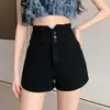 Comercio transfronterizo Pantalones cortos de mezclilla ajustados línea A para chicas sexys, shorts de mezclilla negros de cintura alta para mujer, verano, con un diseño irregular que estiliza la figura