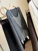 Elegante top de punto a rayas de dos piezas falsas retorcidas para mujer, nuevo estilo coreano de otoño, ajuste ceñido, manga larga, blusa única
