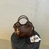 Bolsa de balde retrô para mulheres, nova moda 2026, estilosa, simples, alta qualidade, bolsa de ombro de cor sólida, bolsa transversal casual