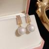 Pendientes colgantes de perla Dongdaemun de estilo coreano para mujer, de alta gama, con microincrustaciones de circonita, aguja de plata S925, joyería de moda para las orejas.