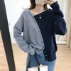Suéter de punto con diseño de botones diagonales irregulares y bloques de color para mujer, versión coreana 2021, suéter básico holgado y favorecedor.