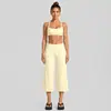 Conjunto de roupa fitness transfronteiriço, com um design traseiro estiloso, um top esportivo de gola halter e calças de yoga de secagem rápida, adequado para corrida ao ar livre, ciclismo e Pilates.