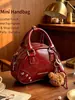 2026 Nova Bolsa de Textura de Alta Qualidade Moda Feminina Versátil Bolsa Transversal Exquisita de Nicho Bolsa de Mão Ombro