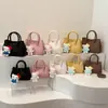 Bolsas de Mujer de Gama Alta de Nicho 2026 Nueva Colección Primavera Versátil Casual Bolso Cruzado Popular Bolso de Mano para Viajes Diarios Bolso Cubo