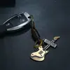 Chaveiro Vintage de Couro Artesanal Simples e Artístico Pequeno Presente Decoração de Guitarra em Liga Pingente de Bolsa