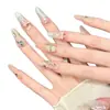 Manicura YiheChampagne Ballet Rosa Naranja Degradado Ojo de Gato Moño con Brillo Fino Dorado Cálido, Uñas Portátiles Elegantes Hechas a Mano