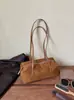 Bolso de Hombro Único para Mujer Suede Bordado Punto de Cruz 2026 Otoño Nuevo Simple Color Sólido Retro Bolso de Mano para Axila