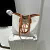 Bolsa Tote Grande de Costura Colorida Contrastante para Mulheres 2025 Nova Versátil para o Dia a Dia Bolsa de Ombro Bolsa de Axila Moda Retrô