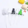18 dientes 20 dientes 24 dientes 28 dientes 410 cabeza de bomba de pulverización fina con banda blanca cabeza rociadora de perfume alcohol