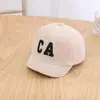 Gorra de Pana Infantil Coreana con Visera Corta Moda Otoño Hombres y Mujeres Bebé Color Sólido Bordado de Letras Gorra de Béisbol Moderna