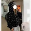 Sudadera con capucha de estilo retro americano con estampado de estrellas y mangas raglán, nuevo diseño unisex con corte relajado y cierre de cremallera