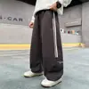 Roupas Infantis Calças para Meninos Estilo Primavera e Outono 2026 Novas Roupas Casuais de Outono Crianças Média e Grande Calças Compridas Calças de Outono Roupa de Trabalho Meninos