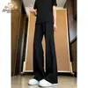 Pantalones Holgados de Calle para Hombre Otoño 2026, Estilo Retro Simple de Hong Kong, Elegantes y Adelgazantes, Hacen que las Piernas Parezcan Largas, Ligeramente Acampanados, Modernos