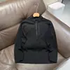 Estilo clásico versátil con media cremallera, top de manga larga con cuello alto y media cremallera con costuras selladas 13111