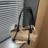 2026 Nueva Moda Otoñal Casual Gran Capacidad Textura Simple Bloque de Color Elegante Versátil Bolso de Hombro Único Transfronterizo