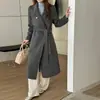 Abrigo largo de lana de doble cara de alta calidad con cuello alto de temperamento para mujer, nuevo estilo de otoño e invierno con cinturón, abrigo de lana holgado adelgazante