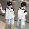 Camiseta de manga larga de algodón puro con bloques de color elegantes para primavera temprana para niños, camiseta básica versátil estilo coreano casual con manga raglán para niños mayores