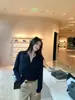 Estilo old money: Suéter de punto con cuello polo para mujer, perfecto para el otoño, que ofrece un look relajado y juvenil con un diseño casual de cuello en V y mangas largas.