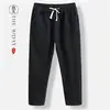 Pantalones cortos de lino de verano para hombre, pantalones casuales rectos de seda helada holgados para hombre, pantalones cortos finos, pantalones de moda