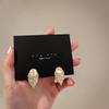 Pendientes Vintage Estilo Hong Kong 2026 Nuevos Pendientes de Botón Metálicos de Alta Gama Moda de Nicho Pendientes Versátiles Venta al por Mayor para Mujeres