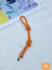 Llavero Colgante Creativo Nuevo Transfronterizo Correa de Cuero Color Caramelo Versátil de Moda Accesorio para Bolsa Venta al por Mayor en Stock