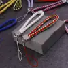 Lanyard para teléfono móvil al por mayor de fábrica, cordón para llavero de cámara de cuero PU, cuerda de muñeca para teléfono móvil de pareja, cuerda tejida de cuero