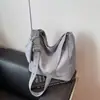 Nova Bolsa de Lona de Cor Pura de Grande Capacidade 2025 Bolsa de Ombro para Estudante e Trajeto Diário de Grande Capacidade Estilo Coreano Bolsa Transversal Simples