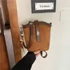 Bolso cubo de alta gama con temperamento cruzado, bolso de mano de tendencia retro coreana, bolso simple versátil para el trabajo, de un solo hombro, cruzado
