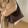 Bolsa Tote de Couro Macio Retrô de Nicho Feminina 2026 Nova Bolsa Grande Capacidade Mãe-Filho Moda Versátil Ombro Transversal