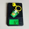 Llavero colorido con diseño de "explosión de calorías", con campanitas pequeñas, hamburguesa, cerveza, papas fritas, palomitas de maíz y otros dijes con temática de comida, adecuado como accesorio para estudiantes