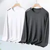 Temporada de primavera y otoño, camiseta lisa de manga larga popular, corte holgado, cuello redondo, camiseta interior para hombre, top simple y versátil