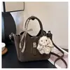 Bolso Cubo Retro de Alta Gama de Nicho Transfronterizo para Mujer 2026 Nuevo de Moda Popular Bolso Cruzado Versátil Bolso de Viaje