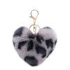 Leopardo europeo y americano amor felpa bola de pelo llavero placa bola de pelo llavero colgante para mujer Regalos Creativos Mayoreo