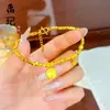 Pulsera de pepitas de oro estilo tienda de oro con diseños de pata de gato, pentagrama, terrón de azúcar y trébol de cuatro hojas, joyería de mujer moderna y versátil al por mayor