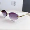 Gafas de sol sin montura de borde cortado con lentes cruzadas de nuevo estilo, Gafas de sol metálicas con montura ovalada retro, Gafas de moda trendy europeas y americanas