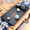 Bandeja de té de piedra negra sintética para uso doméstico, integrada con tetera, juego de oficina totalmente automático, bandeja de té de piedra integrada