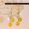 EZ5435 pendientes europeos y americanos transfronterizos para mujer, nuevo colgante de cuentas, hoja verde, lirio, orquídea, moda, temperamento, joyería para orejas de mujer