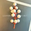Atacado de fabricante transfronteiriço de frutas vermelhas artificiais, frutos de azevinho da sorte, decorações festivas de Natal e Ano Novo para casa