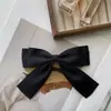 En Stock Negro Versátil Broche de Lazo Decoración Hecho a Mano Desmontable Accesorio para Abrigo Broche con Flor de Cinta
