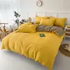Conjunto de Quatro Peças de Roupa de Cama de Flanela de Algodão Lavado Amiga da Pele Estilo Fresco, Conjunto Simples de Três Peças de Lençol e Capa de Edredom para Cama de Solteiro de Dormitório Estudantil