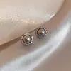 Pendientes de Perla de Circonita de Moda de Aguja Plateada Pendientes de Botón Retro de Lujo Ligero de Nicho Francés Pendientes Nuevos 2026